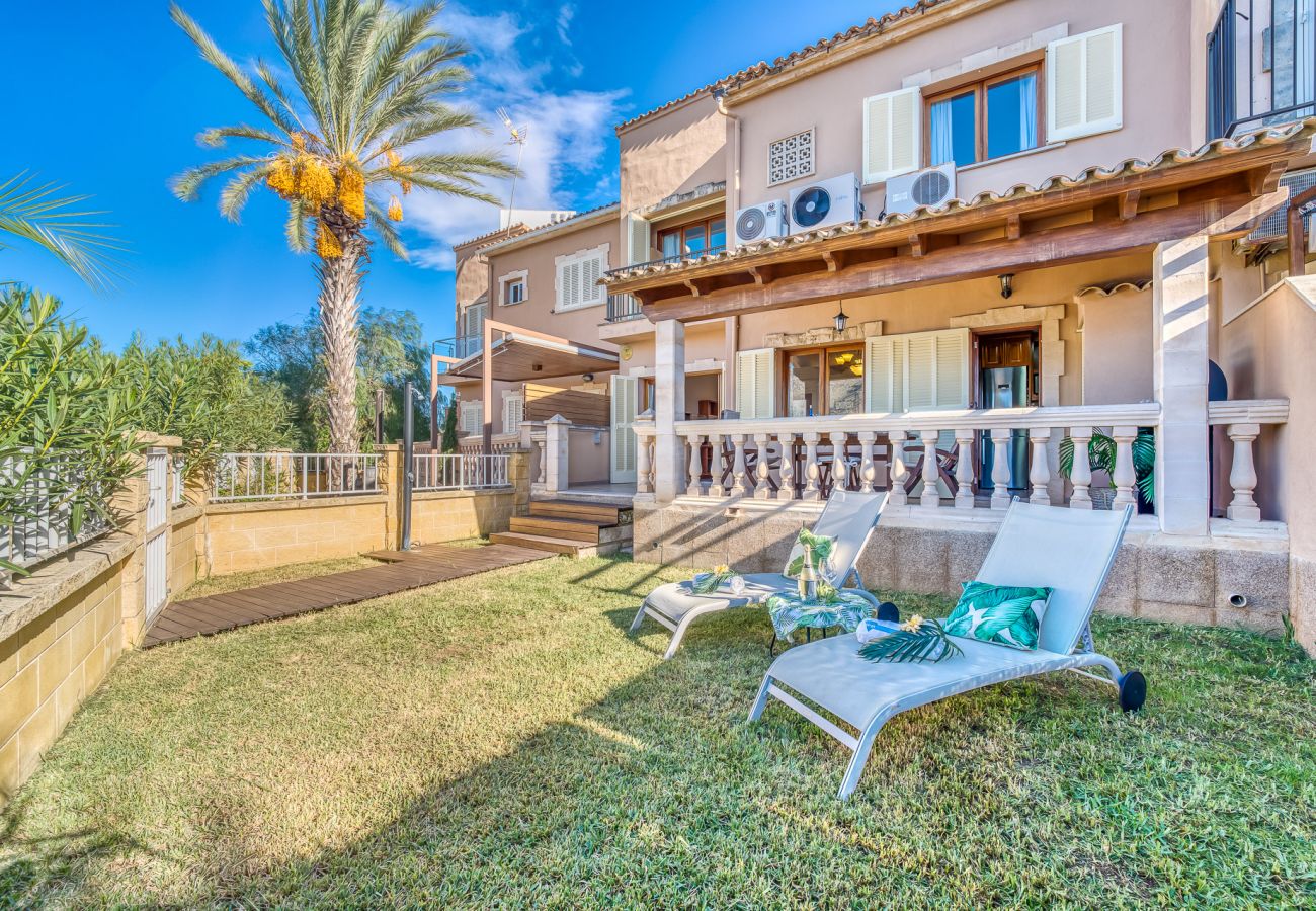 Acogedora casa en Playa de Alcudia con jardín