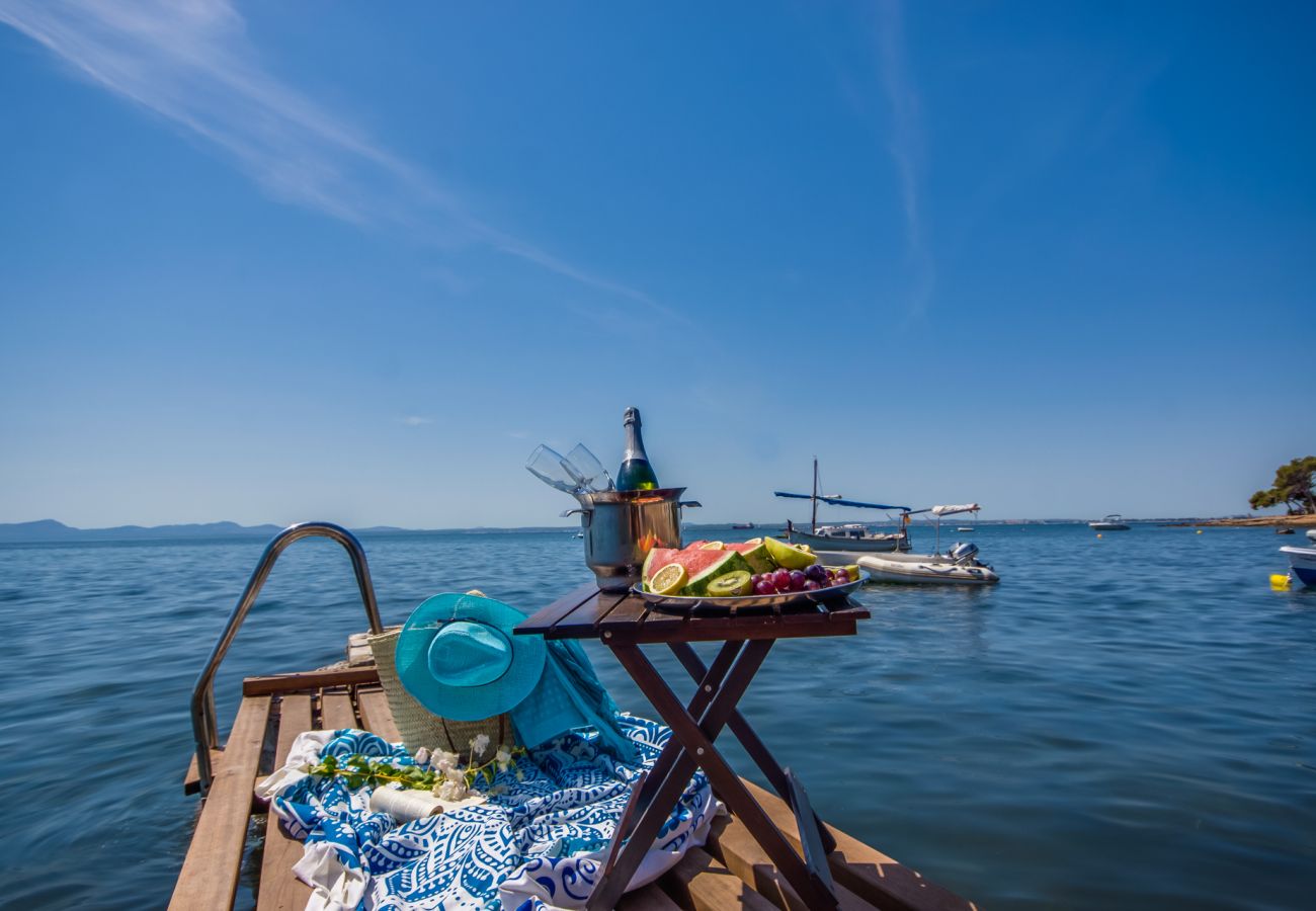 Maison sur la plage d'Alcanada près de la mer